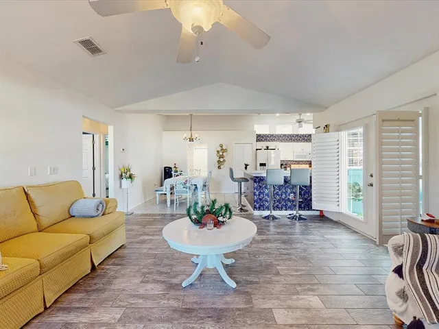 a bedroom with a large bed and window