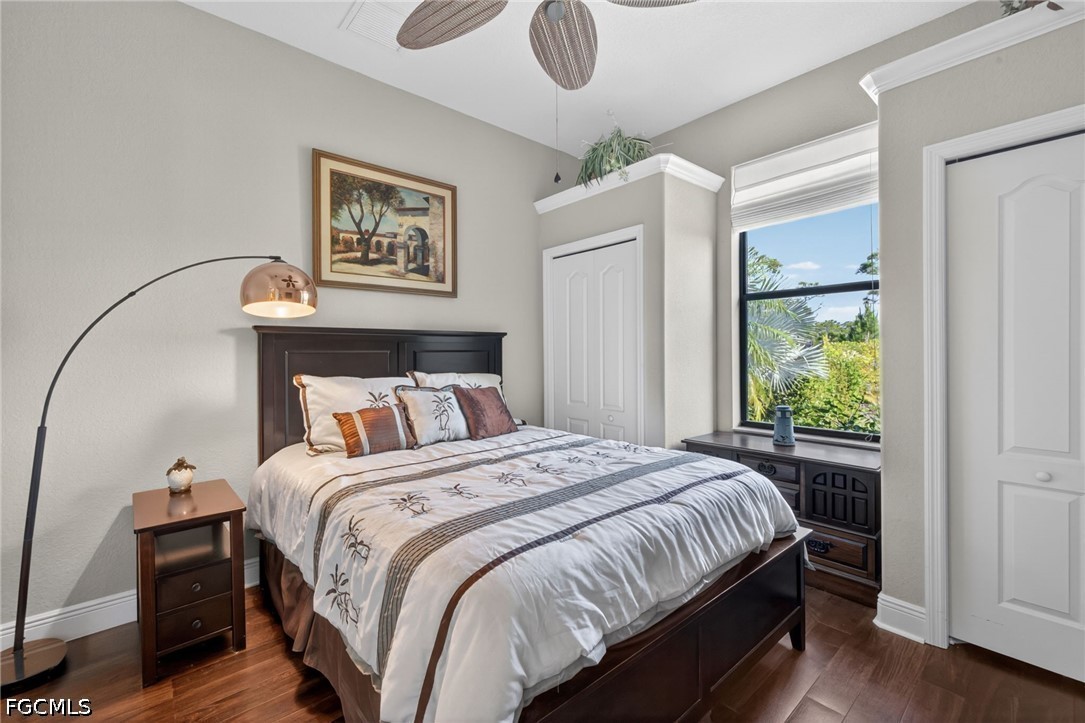 6109 Calusa Rdg Trail Bokeelia, FL 33922 - Photo 32 of 48 a bedroom with bed and a window