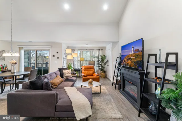 a balcony with furniture and wooden floor