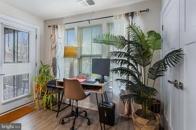 a view of balcony with furniture