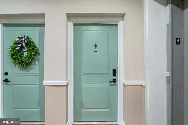 a view of a room with wooden floor and closet