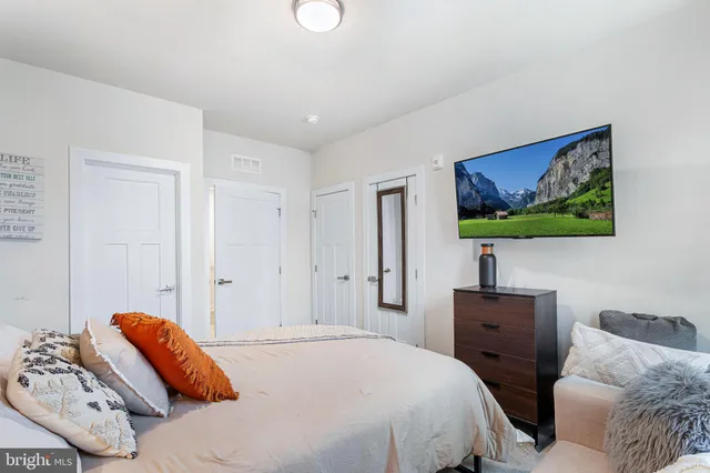 a bathroom with a toilet and a bathtub