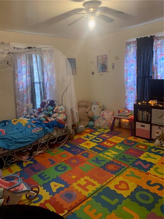 451 Delaware Avenue Rochester, PA 15074 - Photo 16 of 19 a bedroom with a bed and a table