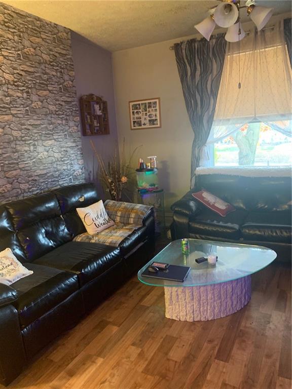 451 Delaware Avenue Rochester, PA 15074 - Photo 8 of 19 a living room with a couch