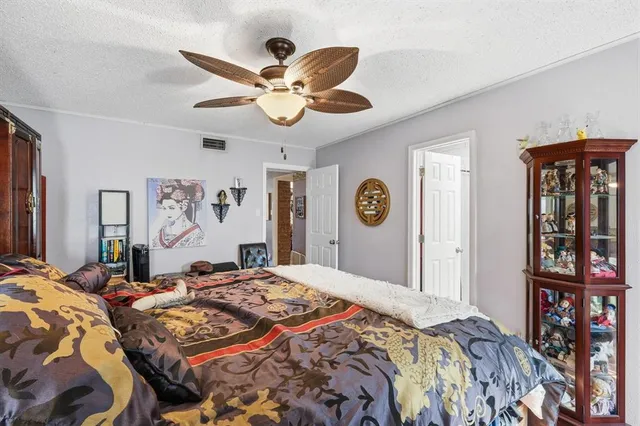 a bathroom with a sink vanity and mirror