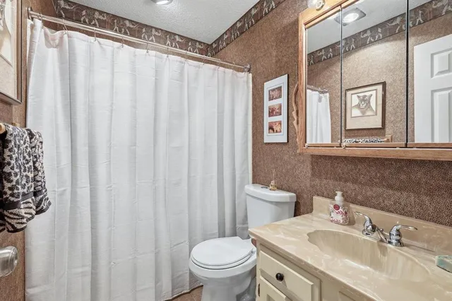 a bedroom with furniture and a bed