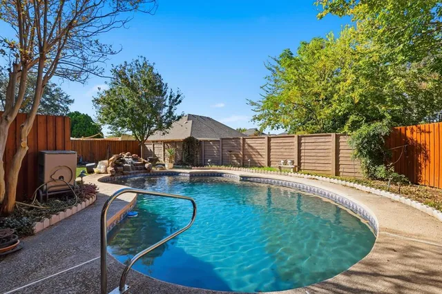 a view of a house with swimming pool
