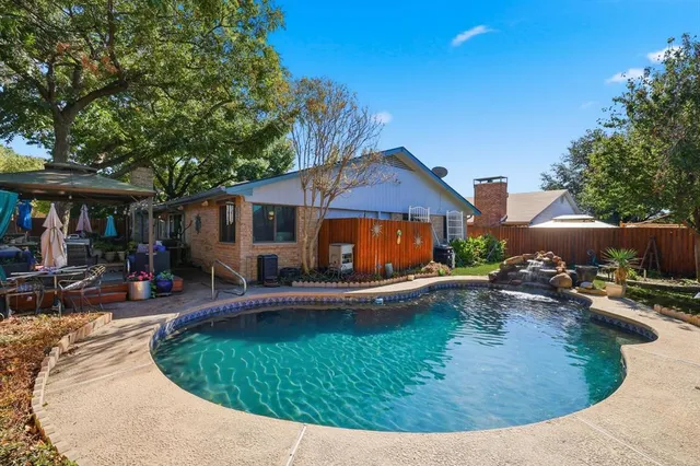 swimming pool view with a outdoor seating
