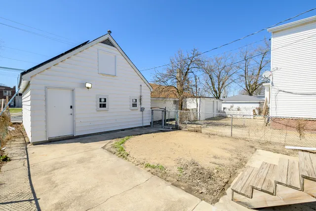a view of a house with snow on the wall