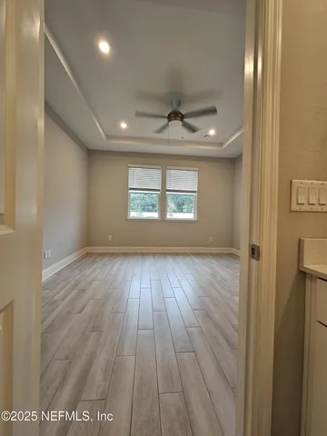 a bathroom with a tub a sink and a shower