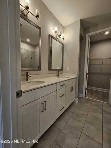 a front view of a house with a yard table and chairs