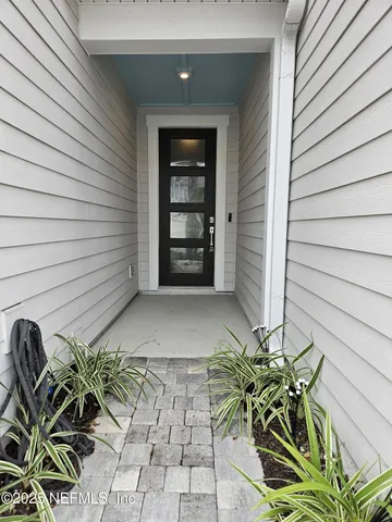 a view of a back yard of the house