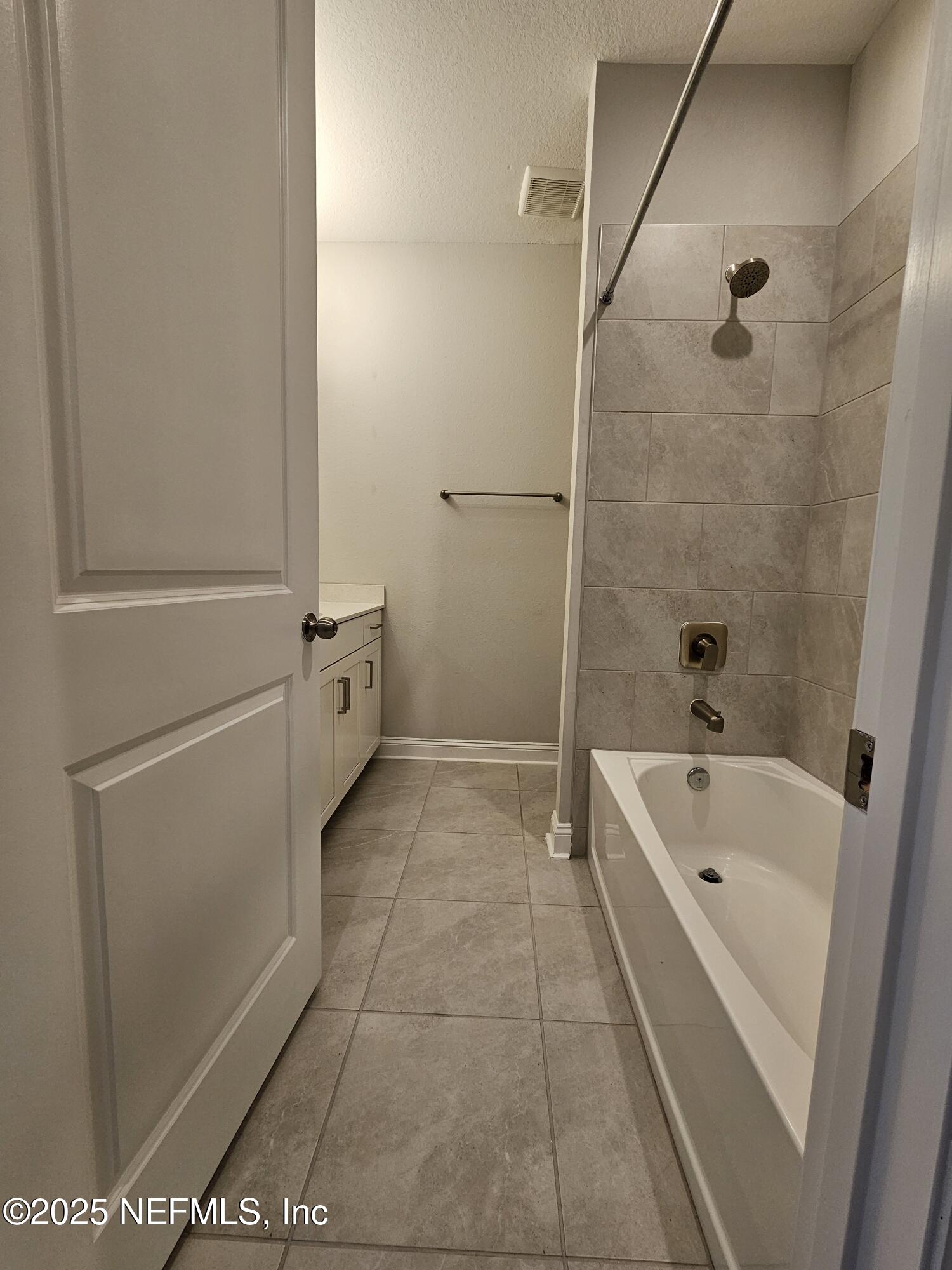 3434 Marsh Reserve Boulevard Jacksonville, FL 32224 - Photo 31 of 39 a bathroom with a tub a sink and a shower