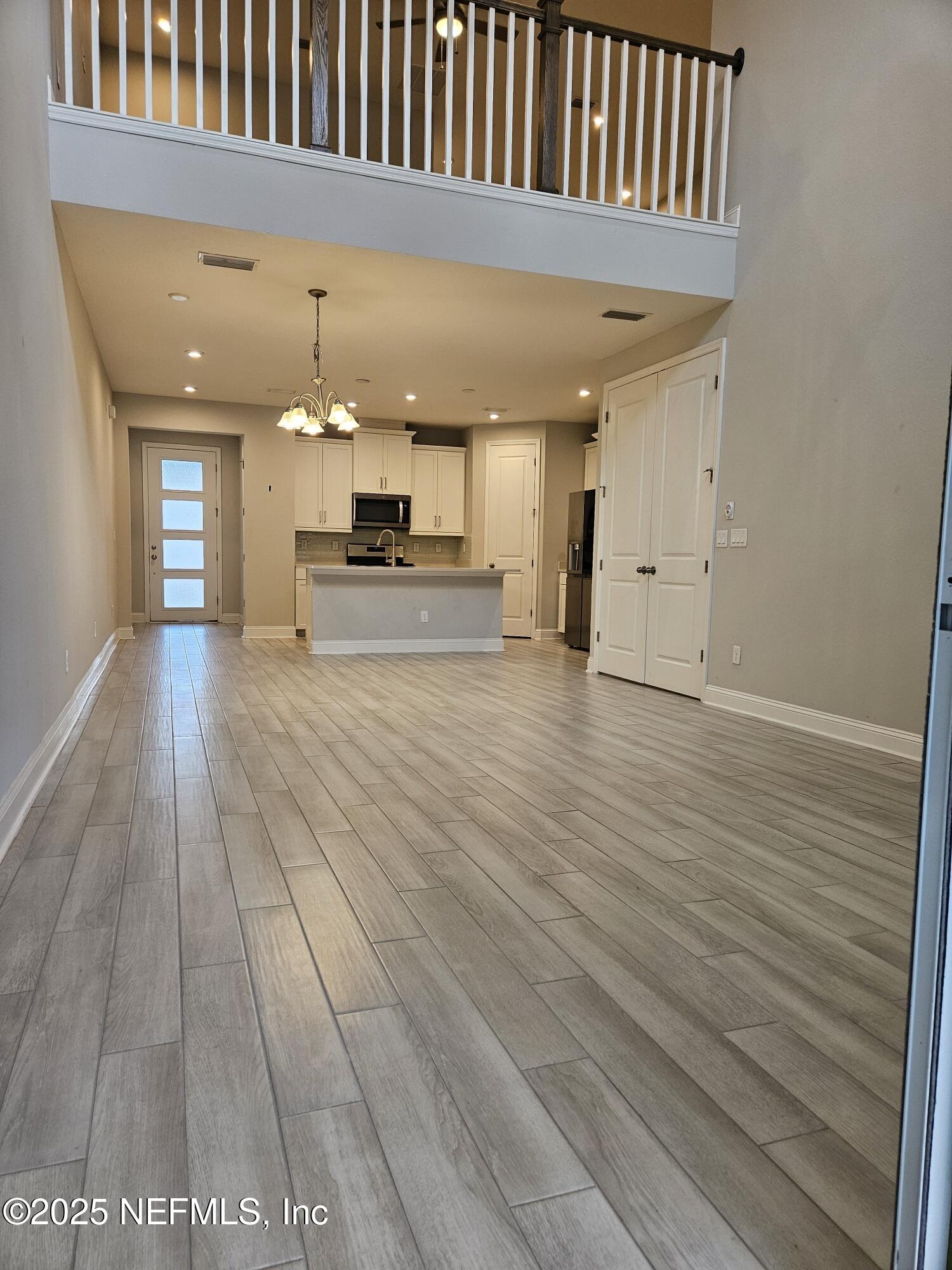 3434 Marsh Reserve Boulevard Jacksonville, FL 32224 - Photo 9 of 39 open kitchen & 2nd floor loft