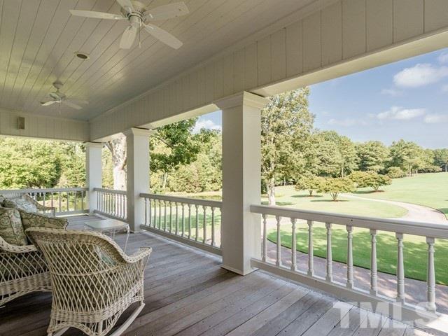 4613 Stormy Gale Road Raleigh, NC 27614 - Photo 16 of 30 a view of a porch with wooden floor