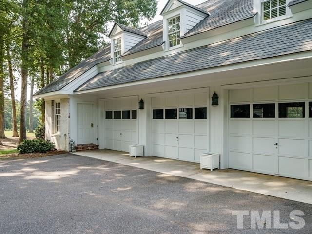 4613 Stormy Gale Road Raleigh, NC 27614 - Photo 21 of 30 a view of a house with a large windows