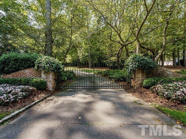 4613 Stormy Gale Road Raleigh, NC 27614 - Photo 30 of 30 a view of a pathway with a garden