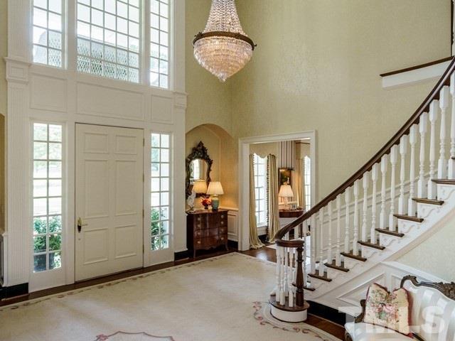 4613 Stormy Gale Road Raleigh, NC 27614 - Photo 4 of 30 a view of entryway with wooden floor and stairs