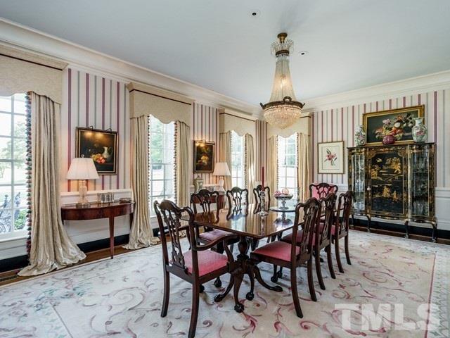 4613 Stormy Gale Road Raleigh, NC 27614 - Photo 7 of 30 a view of a a dining room with furniture window and outside view