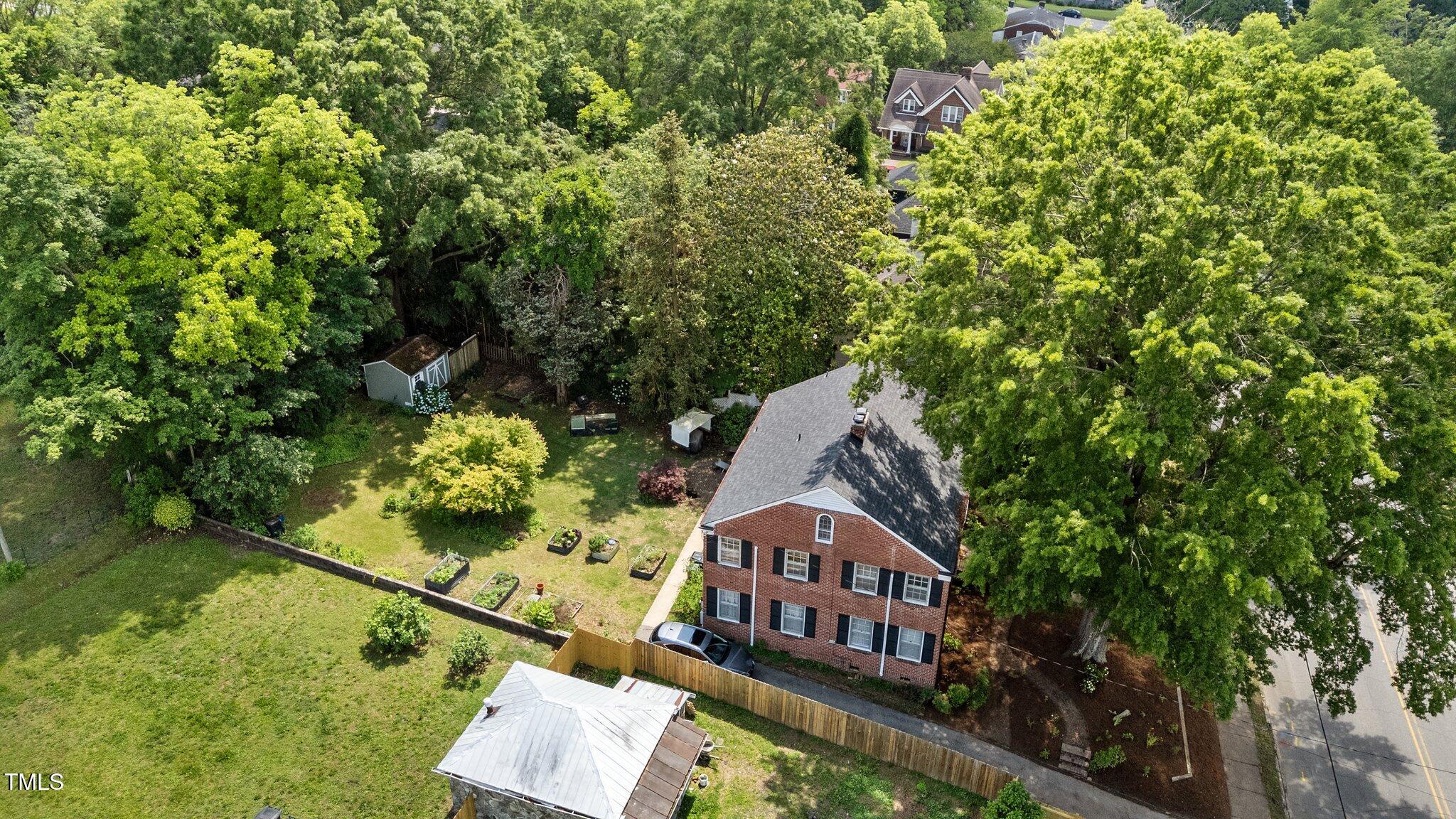 925 South Chestnut Street Henderson, NC 27536 - Photo 22 of 28 an aerial view of a house with a yard
