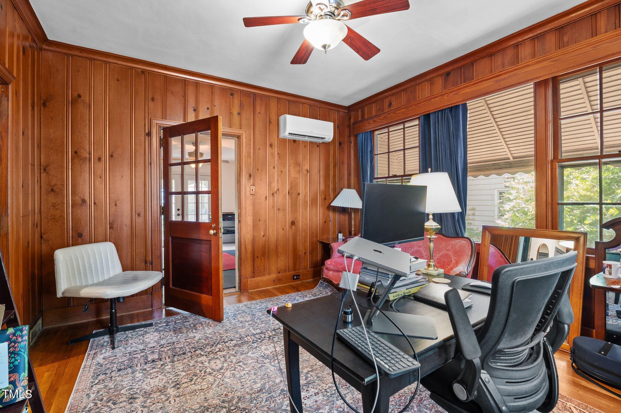 925 South Chestnut Street Henderson, NC 27536 - Photo 10 of 28 a living room with furniture and a window