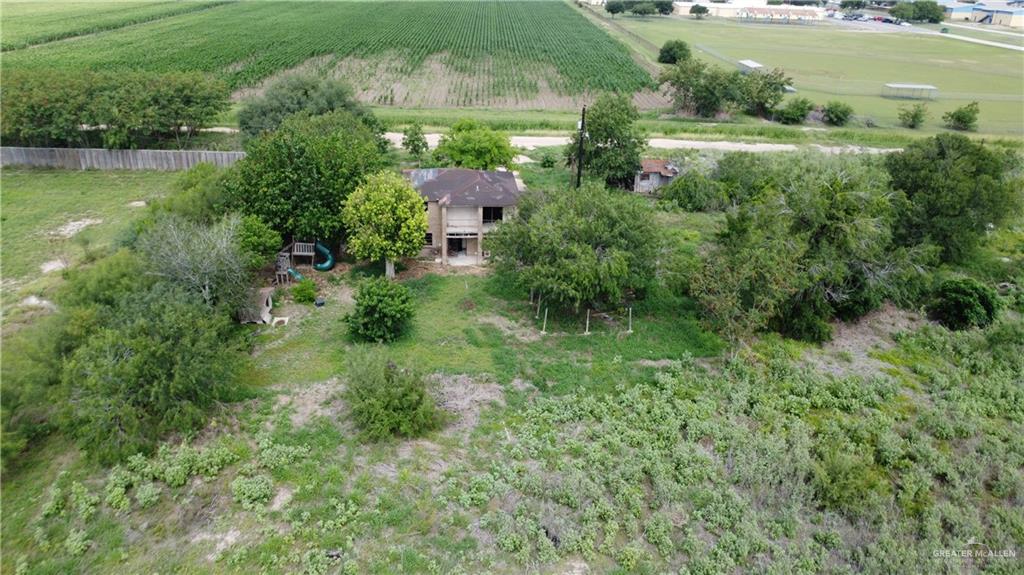 1524 West Hi Line Road Pharr, TX 78577 - Photo 20 of 34 a view of a garden with a building