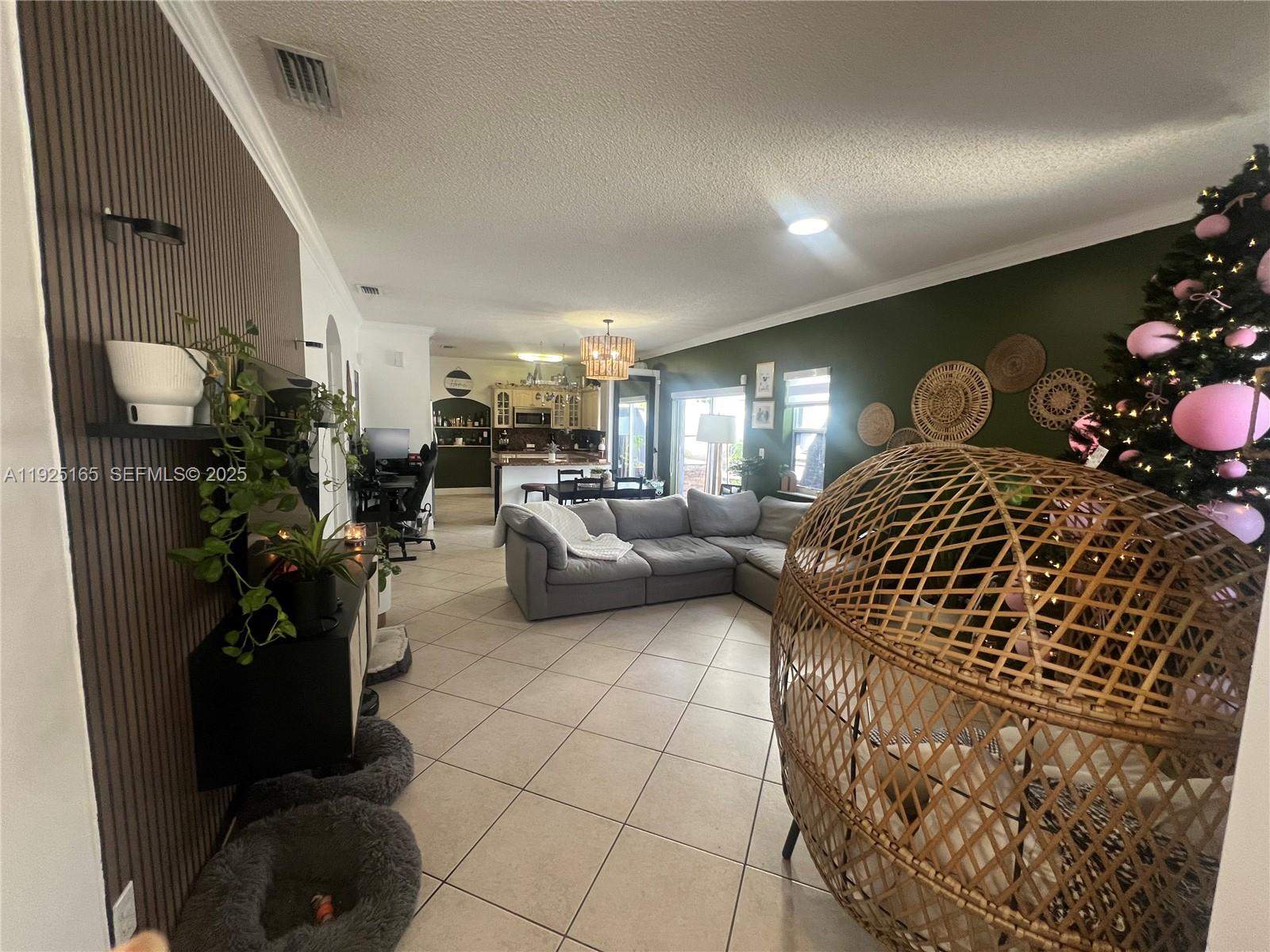 12446 Southwest 198th Street Miami, FL 33177 - Photo 4 of 56 a living room with furniture