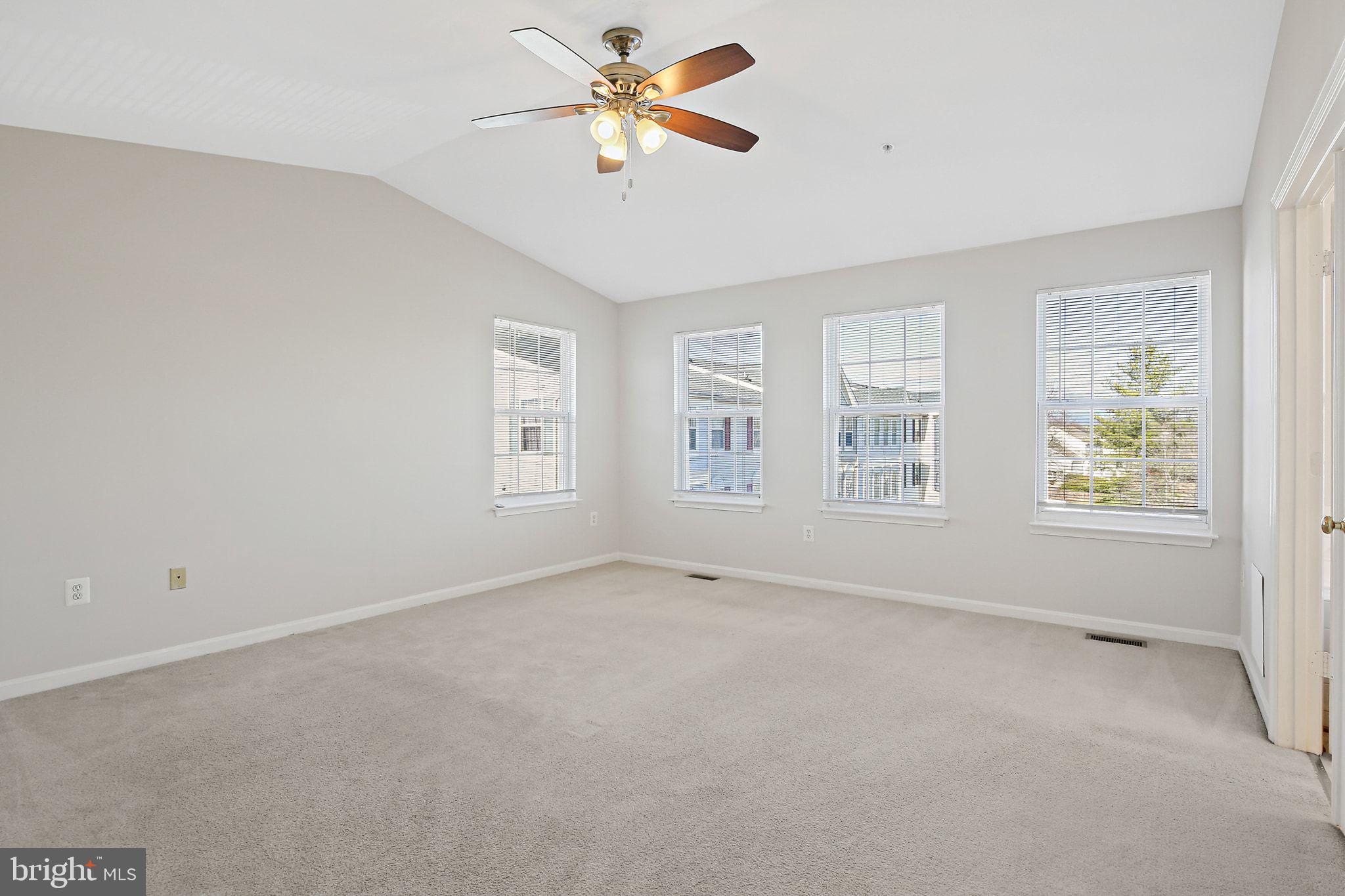 5016 Croydon Terrace Frederick, MD 21703 - Photo 16 of 34 wooden floor in an empty room with a window