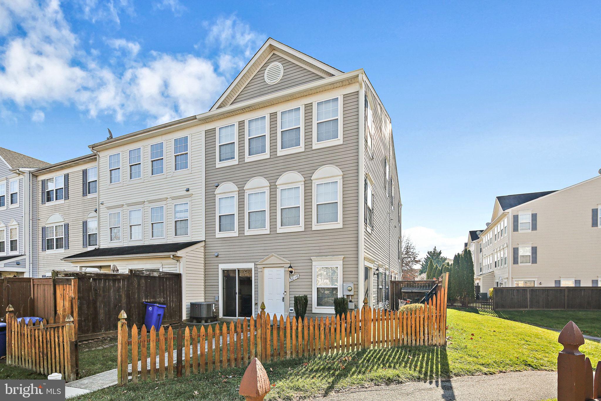 5016 Croydon Terrace Frederick, MD 21703 - Photo 2 of 34 a front view of a building with garden