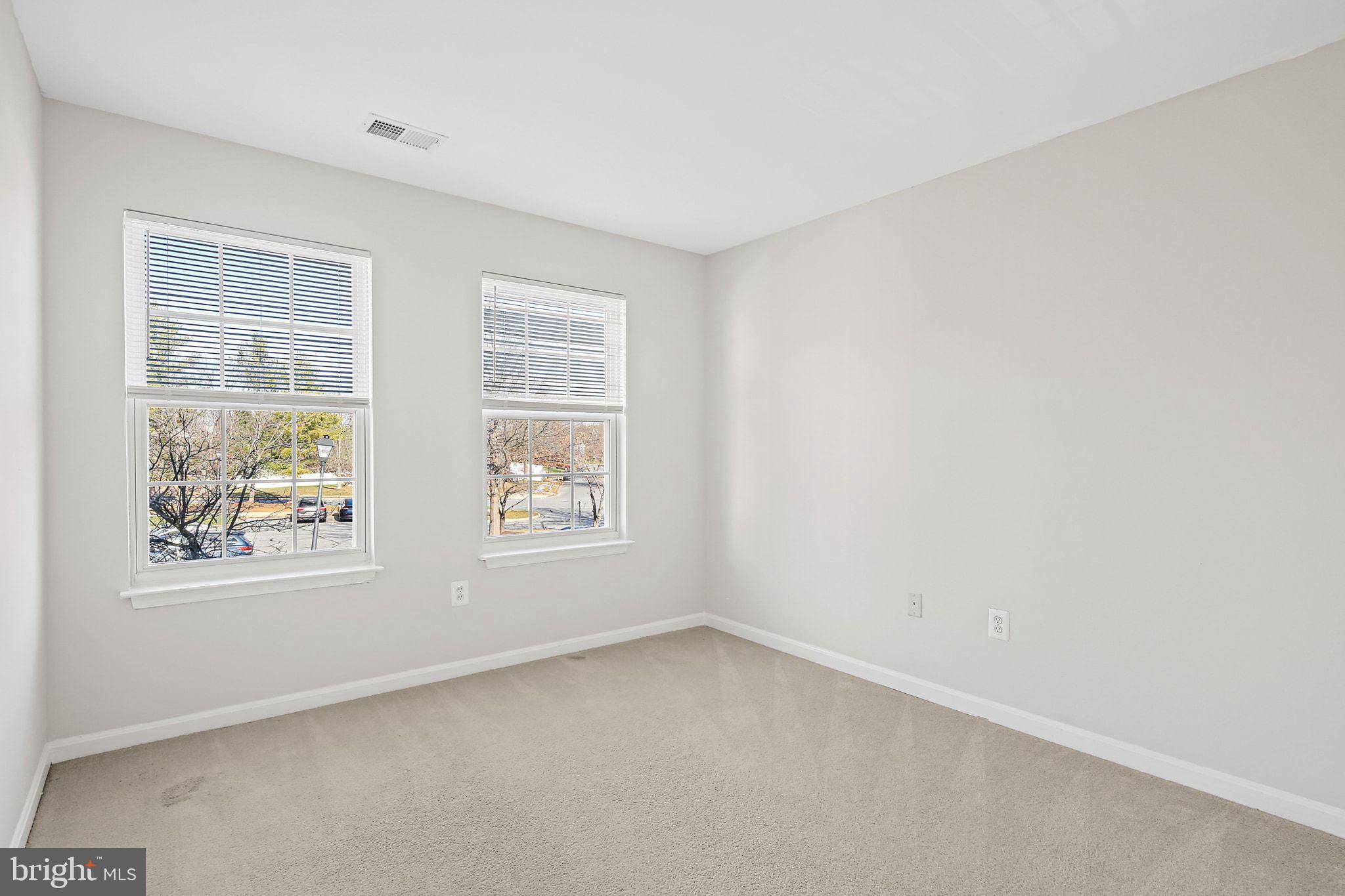 5016 Croydon Terrace Frederick, MD 21703 - Photo 29 of 34 an empty room with windows