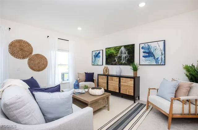 a bedroom with a bed and a lamp