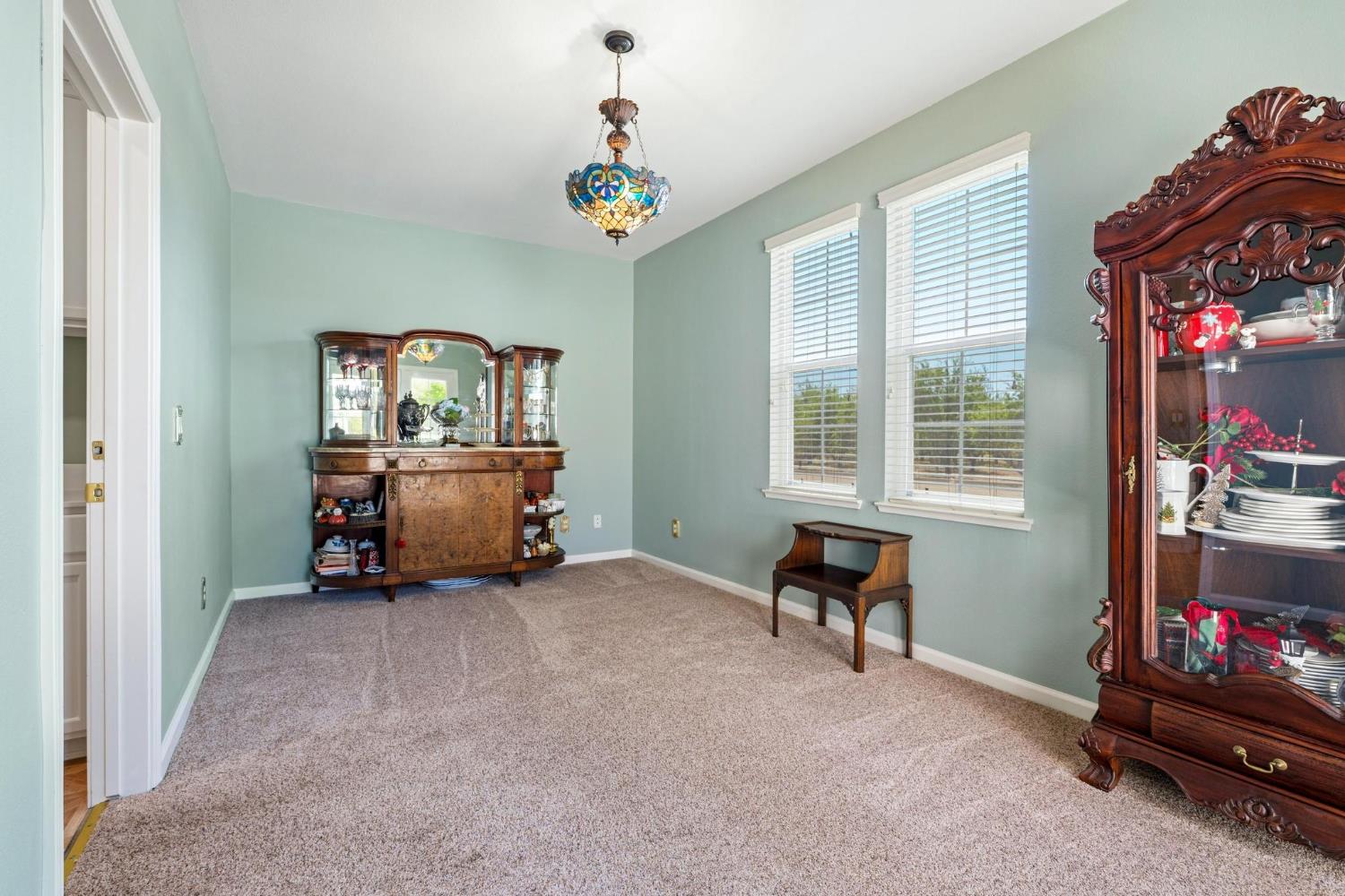 426 South Highland Avenue Ripon, CA 95366 - Photo 47 of 82 a living room with furniture and a flat screen tv