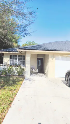 a terrace with outdoor seating and city view