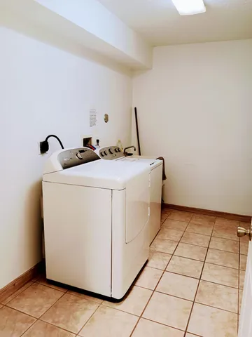 a kitchen with stainless steel appliances granite countertop a sink and a stove