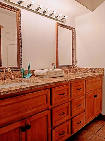 a view of a tree in a yard