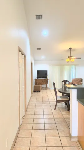 a terrace with outdoor seating and city view