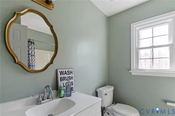 a view of a house with a small yard