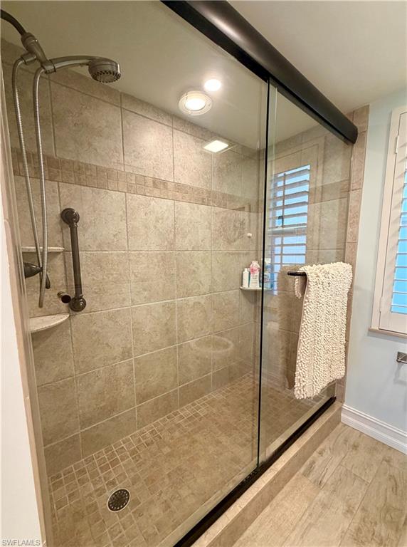 105 Penny Lane, Unit 5 Naples, FL 34112 - Photo 10 of 15 a bathroom with a shower