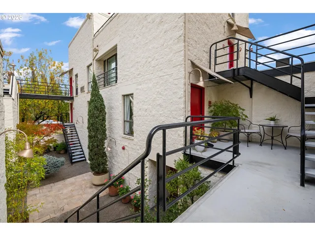 a view of a car parked in front of a house