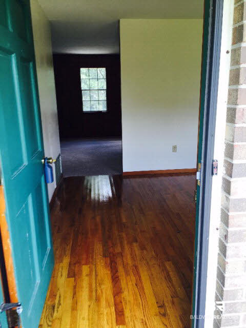 39660 Hannis Williams Road Bay Minette, AL 36507 - Photo 3 of 32 For Sale: 39660 Hannis Williams Road, Bay Minette, AL 36507 Welcome Front Door to gleaming hardwood floors!
