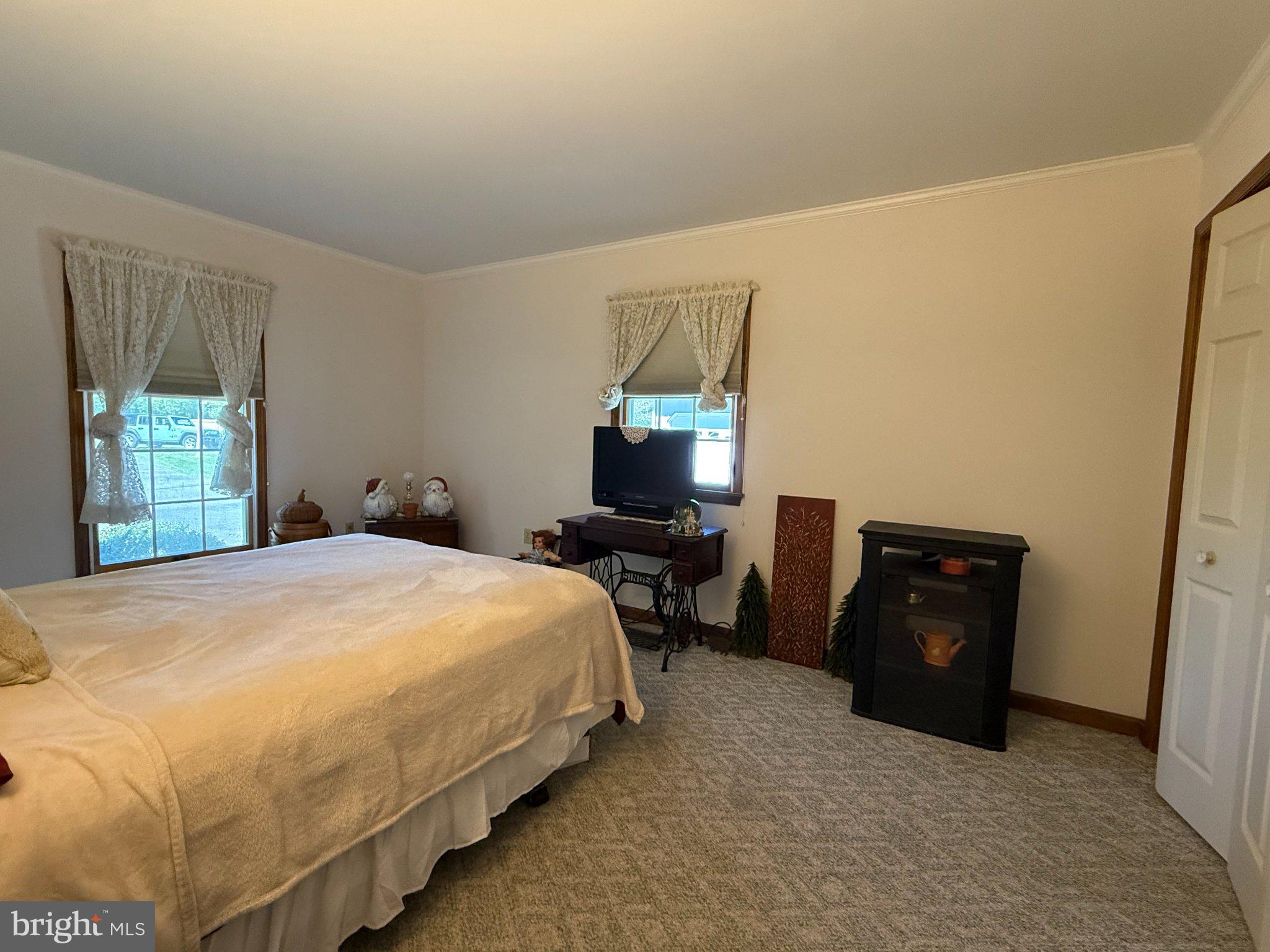 22889 Hog Creek Road Preston, MD 21655 - Photo 15 of 25 Cozy bedroom with natural light.