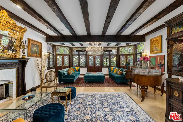 a living room with furniture and a rug