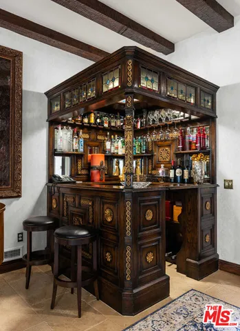 a view of a cafe with sitting area