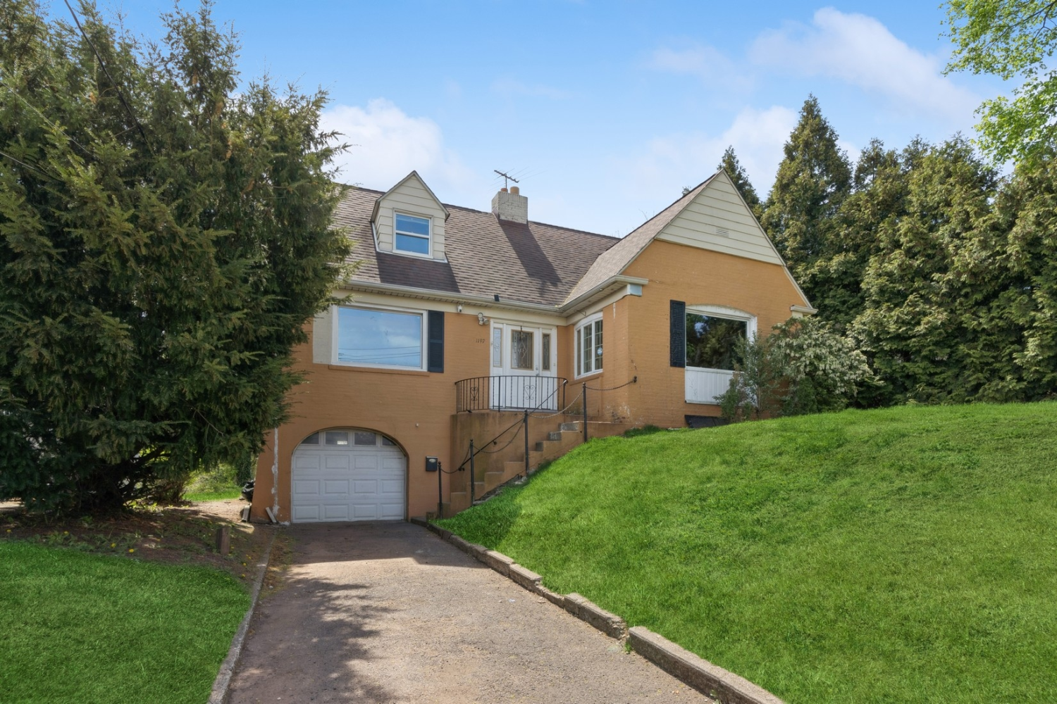 1197 Todt Hill Road Staten Island, NY 10304 - Photo 10 of 17 front view of a house with a yard