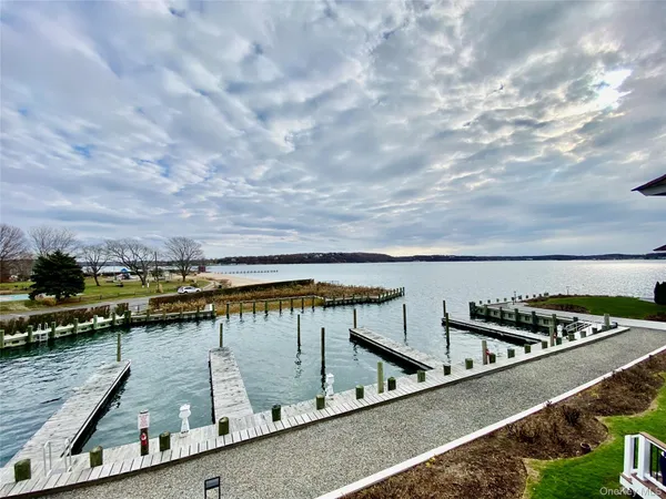 a view of a balcony with chairs