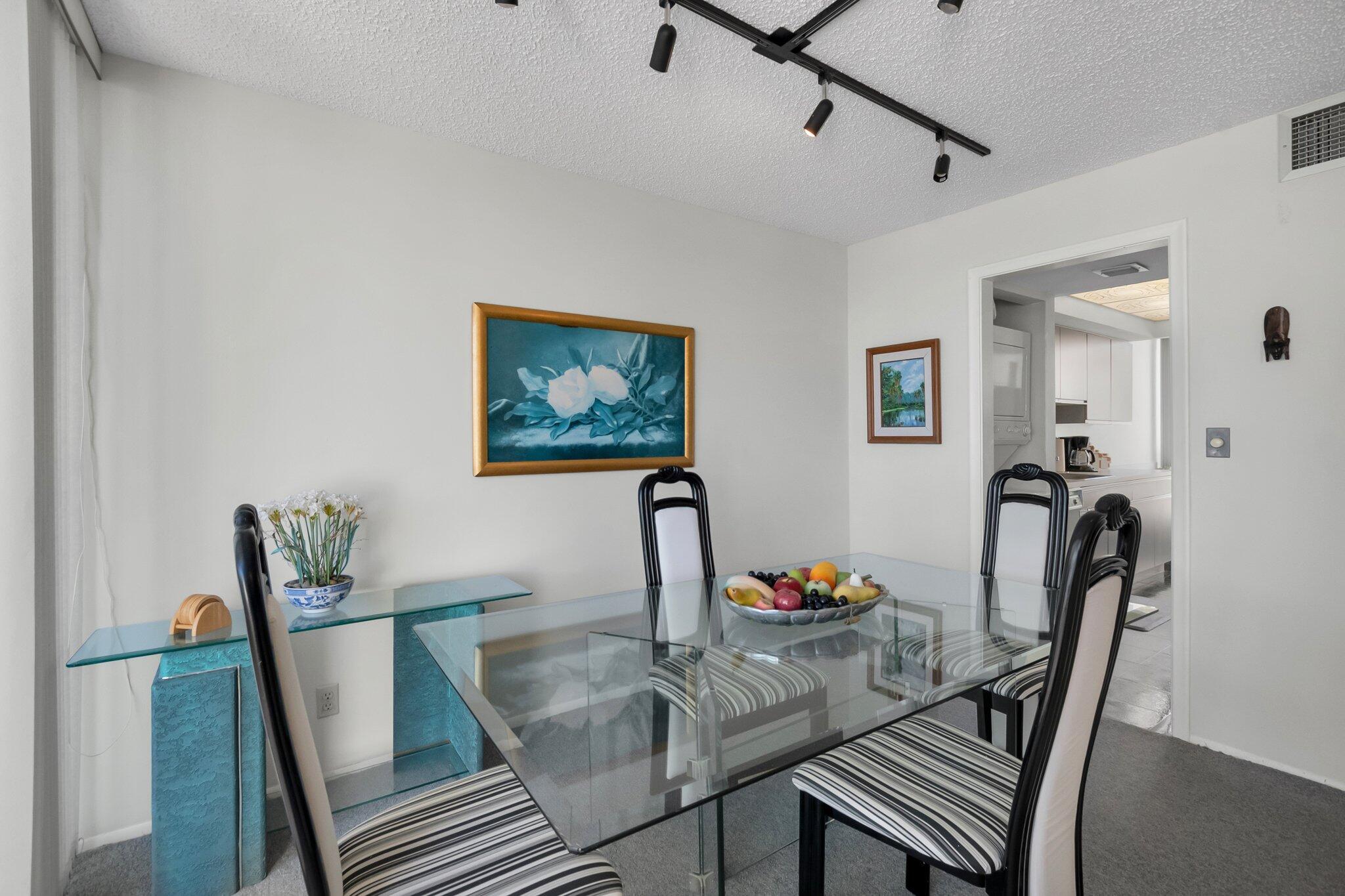 805 Bridgewood Place Boca Raton, FL 33434 - Photo 11 of 60 a view of a dining room with furniture