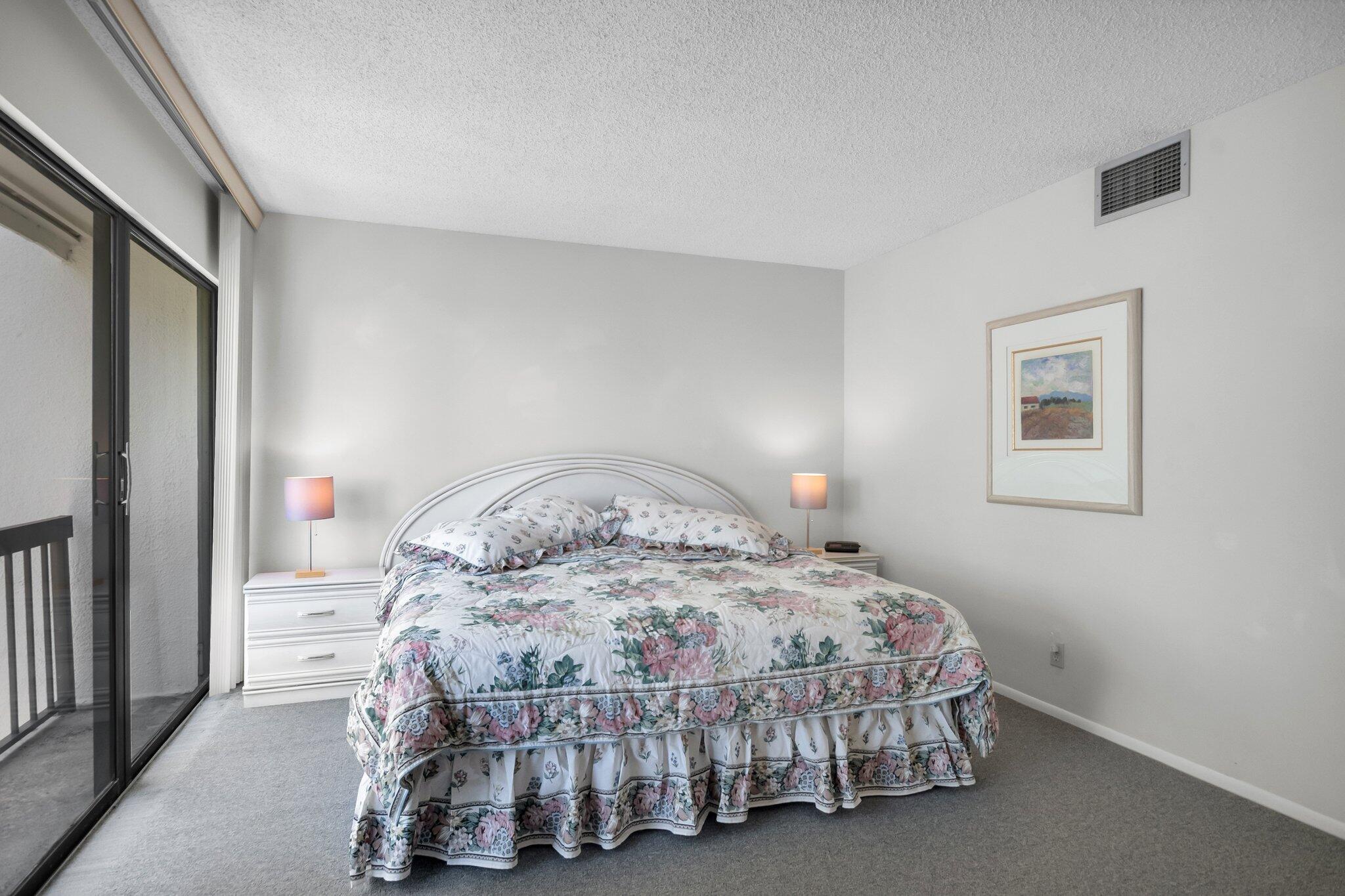 805 Bridgewood Place Boca Raton, FL 33434 - Photo 18 of 60 a bedroom with a bed and a window