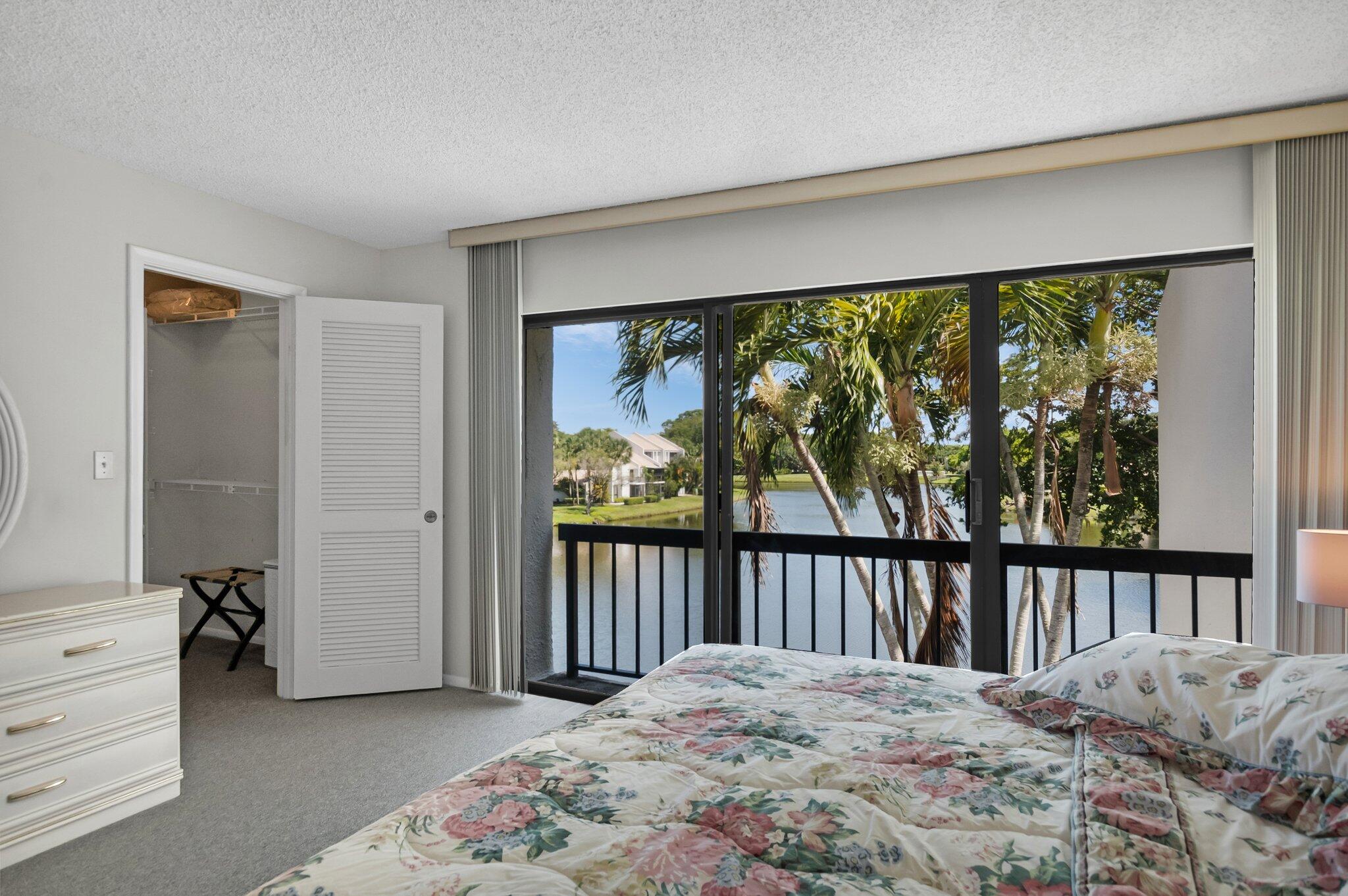 805 Bridgewood Place Boca Raton, FL 33434 - Photo 2 of 60 a bedroom with a bed and a window