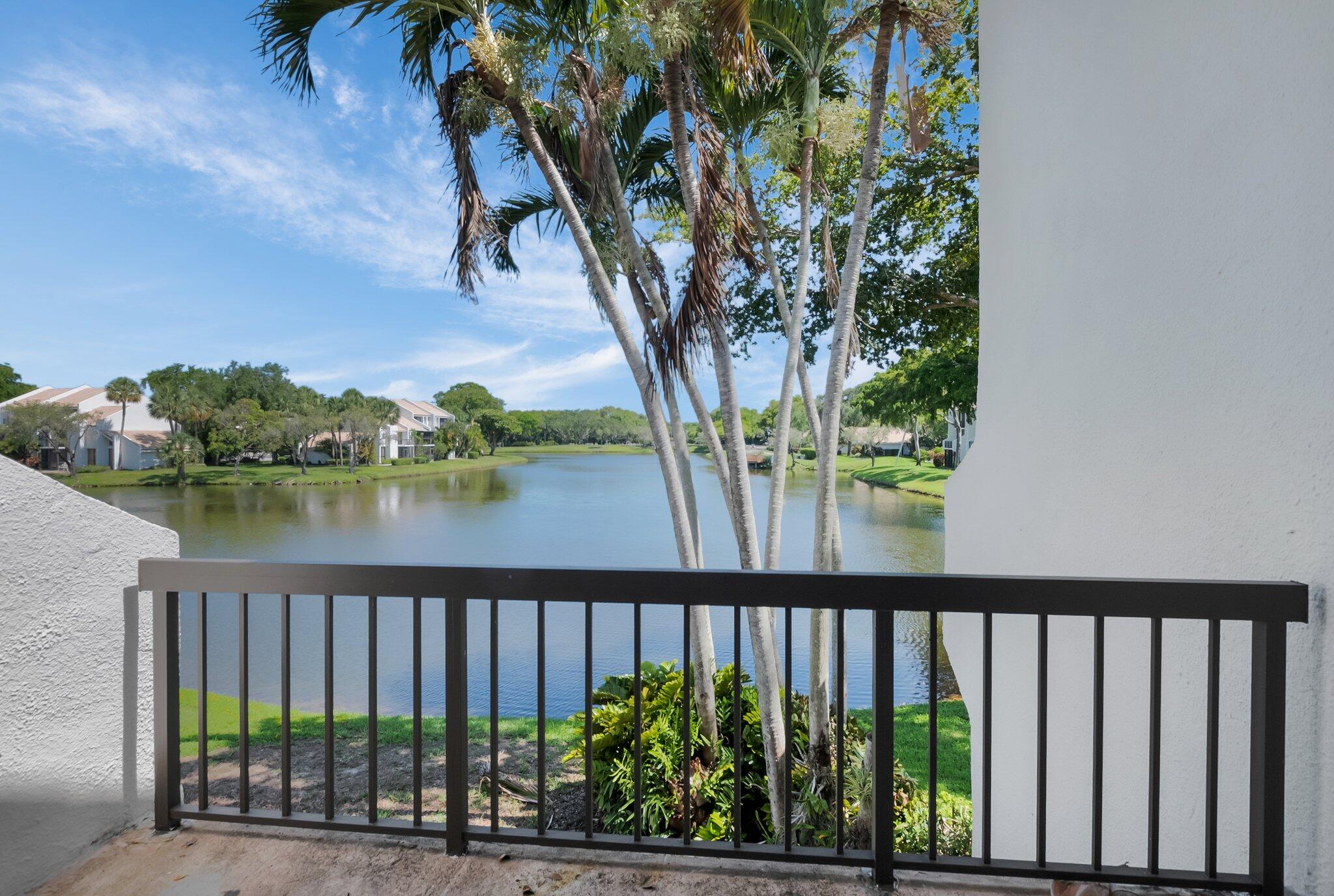 805 Bridgewood Place Boca Raton, FL 33434 - Photo 24 of 60 a view of a lake from a balcony