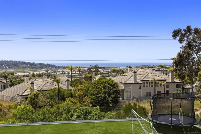 a room with gym equipment and a large window
